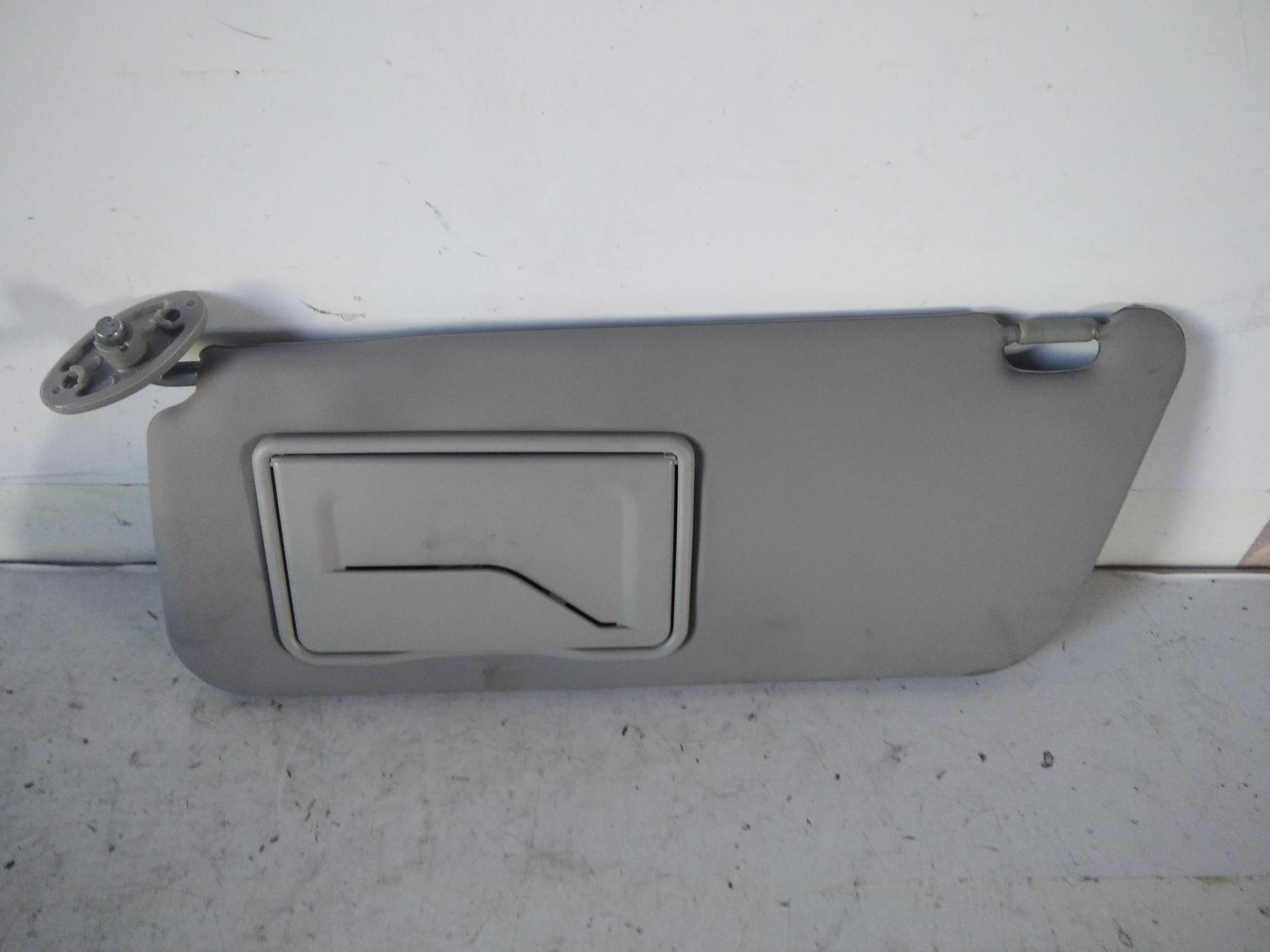 Aletta parasole parabrezza sx.